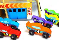 Genevieve Teaches Kids with Colorful Cars and Parking Deck! 1