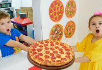 Kids learn how to cook pizza and help each other 12